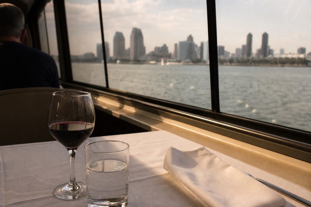 Champagne glasses and festive table setting on a cruise ship, no text, no logos, no people