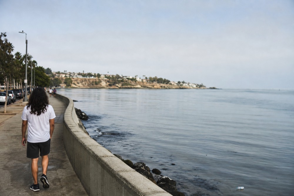 Calm gray ocean surface under a soft morning sky near San Diego, no text, no logos, no people