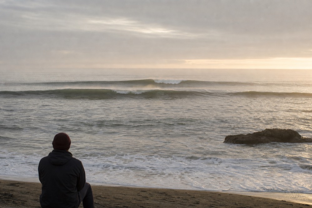 Open ocean swells off the San Diego coast under clearing morning light, no text, no logos, no people