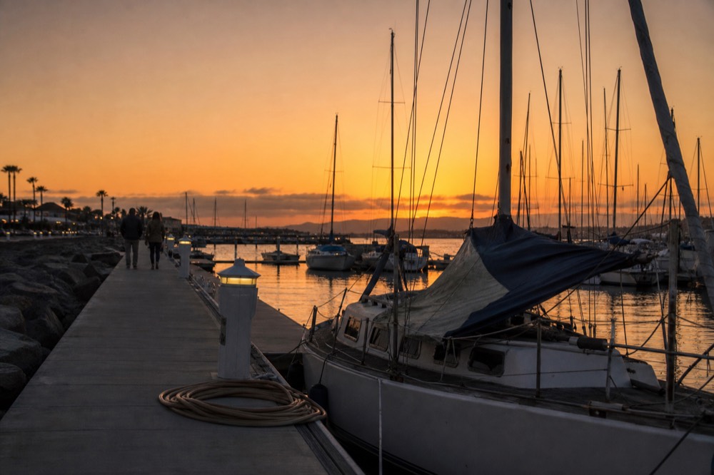 Harbor Drive and moored vessels along the San Diego waterfront in morning light, no text, no logos, no people